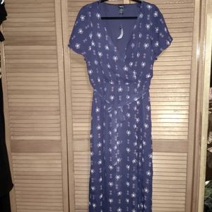 Never been worn dress. Short skirt inside since see through material